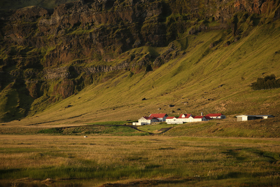Nat Geo Expeditions, Iceland South Coast Adventure - Houses in the bottom of the mountain