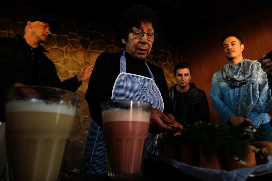 Nat Geo Expeditions - Tierra Sagrada Incas - Woman preparing drinks